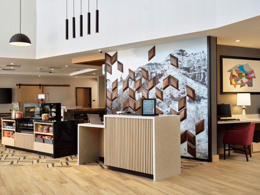 Kuvio wall help make a memorable first impression at the front desk of the Amarillo Hyatt.