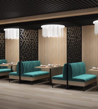 Modern flush mounted light fixtures emit soft lighting in restaurant dining nooks.