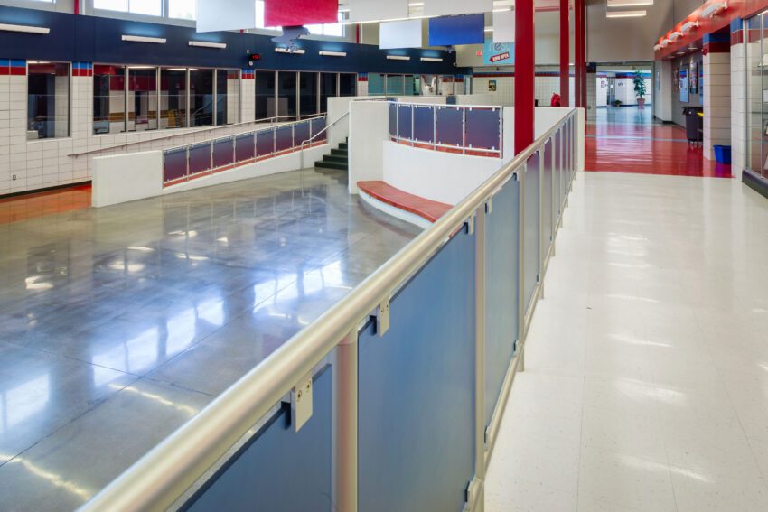 Using Lumicor's Resin Panels along the stairway and railings at Glendale High School provides color and durablility.