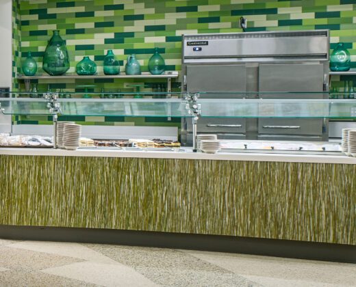 Foodcourt counter clad in naturally-inspired wall protection.